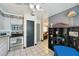 Kitchen features stainless steel appliances, tile floors, and neutral walls at 12790 118Th St, Seminole, FL 33778