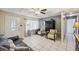 Inviting living area with comfortable seating and a view of the front door at 12790 118Th St, Seminole, FL 33778
