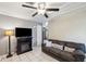 Open-concept living room with a view of the adjacent kitchen at 12790 118Th St, Seminole, FL 33778