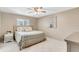 Serene bedroom with a queen-sized bed, decorative pillows, and a cozy ambiance at 1403 Garden Ave, Tarpon Springs, FL 34689
