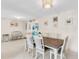 Elegant dining area with stylish chandelier and tasteful decor at 1403 Garden Ave, Tarpon Springs, FL 34689