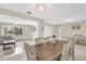 Bright dining room featuring a wooden table, elegant light fixture, and white accents at 1403 Garden Ave, Tarpon Springs, FL 34689