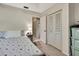 Bright bedroom with closet and ensuite bathroom entrance at 14615 Daybreak Dr, Lutz, FL 33559
