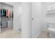Bathroom featuring a toilet and walk-in closet at 15062 Hummingbird Rd, Weeki Wachee, FL 34614