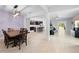 Open concept layout with a dining area, kitchen featuring stainless steel appliances, and comfortable living area at 15062 Hummingbird Rd, Weeki Wachee, FL 34614