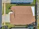 Top-down aerial showcases the home's roof and surrounding yard at 1747 Wood Brook St, Tarpon Springs, FL 34689