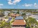 Stunning aerial perspective capturing a residential community with lush landscaping and manicured lawns at 1747 Wood Brook St, Tarpon Springs, FL 34689