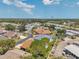 Panoramic aerial view of a neighborhood with a diverse array of homes, landscaping, and well-maintained streets at 1747 Wood Brook St, Tarpon Springs, FL 34689