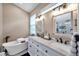 Bright bathroom boasts a soaking tub, double vanity with marble countertop, and modern fixtures at 1747 Wood Brook St, Tarpon Springs, FL 34689