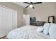 Bedroom with neutral colors, closet and dresser at 1747 Wood Brook St, Tarpon Springs, FL 34689