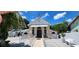 An eye-level shot of a beautiful Orthodox Church with a cross and lovely stone work at 1747 Wood Brook St, Tarpon Springs, FL 34689