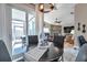 Cozy dining area with sliding glass doors leading to a screened-in patio with a grill at 1747 Wood Brook St, Tarpon Springs, FL 34689