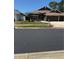 Charming single-Gathering home featuring well-manicured front lawn and attached garage at 1747 Wood Brook St, Tarpon Springs, FL 34689