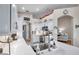 Bright, open kitchen boasts modern appliances, stylish decor, and ample counter space for cooking at 1747 Wood Brook St, Tarpon Springs, FL 34689