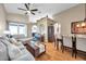 Spacious living room showcasing a seamless transition to the dining area at 1747 Wood Brook St, Tarpon Springs, FL 34689