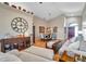 Inviting living room with stylish furnishings, hardwood floors, and a view of the front door at 1747 Wood Brook St, Tarpon Springs, FL 34689
