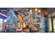A large octopus mural with flowers is featured inside the brewery taproom at 1747 Wood Brook St, Tarpon Springs, FL 34689