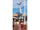 Interesting outdoor shark sculpture art with cigar shop in the background at 1747 Wood Brook St, Tarpon Springs, FL 34689