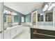 Main bath featuring and vanity, shower and garden tub at 1831 Stable Trl, Palm Harbor, FL 34685
