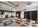 Well-organized garage with durable floor tiles and ample storage solutions at 1831 Stable Trl, Palm Harbor, FL 34685