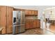 This kitchen has stainless steel refrigerator and lots of cabinet space at 1831 Stable Trl, Palm Harbor, FL 34685