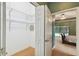 Walk-in closet attached to the main bedroom at 1831 Stable Trl, Palm Harbor, FL 34685