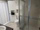 Bathroom featuring a shower and vanity cabinet at 1941 Arvis E Cir, Clearwater, FL 33764