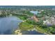 Amazing aerial view of condos near lake surrounded by picturesque neighborhood at 2021 Shangrila Dr # 14, Clearwater, FL 33763