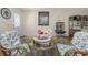 Bright dining area with views to the door and kitchen at 2021 Shangrila Dr # 14, Clearwater, FL 33763