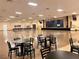 Expansive event space with stage, tables, and chairs, perfect for large gatherings at 2021 Shangrila Dr # 14, Clearwater, FL 33763