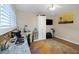 Comfortable home office with a granite desk, storage, and natural light from the window at 2021 Shangrila Dr # 14, Clearwater, FL 33763