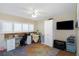 Bright home office with custom built-ins, plantation shutters, and ample workspace for productivity at 2021 Shangrila Dr # 14, Clearwater, FL 33763