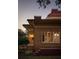 Beautiful brick home featuring intricate detailing, a red tile roof, and manicured landscaping at 2710 N Dundee St, Tampa, FL 33629