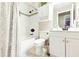 This is the bathroom which includes a shower and tub combination, toilet, sink and vanity at 27343 Warner Ave, Brooksville, FL 34602
