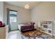 Bright bedroom with a playful rug and white furnishings for a cozy retreat at 2826 Riders Pass, Odessa, FL 33556