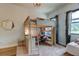 bedroom featuring a loft bed with desk and shelving and decorative pink rug at 2826 Riders Pass, Odessa, FL 33556