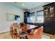 Dining room with custom built-in cabinets and wet bar at 2826 Riders Pass, Odessa, FL 33556