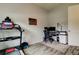 Bright office space featuring a treadmill, desk, and stylish decor, ideal for a productive and healthy work environment at 2826 Riders Pass, Odessa, FL 33556
