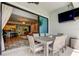 Covered patio with a view of the pool, living space and kitchen at 2826 Riders Pass, Odessa, FL 33556