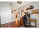 Office with hardwood floors, ample storage, and adjacent to a living space and a view to the kitchen at 31354 Cabana Rye Ave, San Antonio, FL 33576
