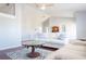Bright, spacious living room features hardwood floors, ceiling fan, and neutral furniture at 320 Crosswinds Dr, Palm Harbor, FL 34683