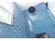 Close up of tiled shower with window and rainfall shower head at 320 Crosswinds Dr, Palm Harbor, FL 34683