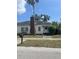 Charming single-Gathering home with a brick chimney, quaint front door and lovely windows at 3210 W North B St, Tampa, FL 33609