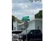 Street sign showing the intersection of W North B ST and N Bradford AV with a view of neighborhood homes at 3210 W North B St, Tampa, FL 33609