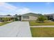 Charming single-story home with a covered carport and well-maintained landscaping in a desirable community at 37639 Newport Dr, Zephyrhills, FL 33542