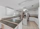 Bright kitchen featuring ample counter space, modern appliances, and plenty of storage, perfect for cooking and entertaining at 37639 Newport Dr, Zephyrhills, FL 33542