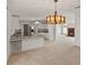 Open-concept kitchen flowing into the living room, ideal for entertaining and everyday living at 37639 Newport Dr, Zephyrhills, FL 33542