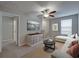 Cozy living room featuring neutral tones, a ceiling fan, and comfortable sectional sofa at 413 Royal Empress Dr, Ruskin, FL 33570