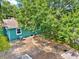This yard features a fire pit, patio, and lush landscaping, perfect for outdoor enjoyment and relaxation at 4330 7Th N Ave, St Petersburg, FL 33713
