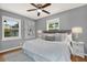 This bedroom features hardwood floors, natural light and a modern, comfortable style at 4330 7Th N Ave, St Petersburg, FL 33713